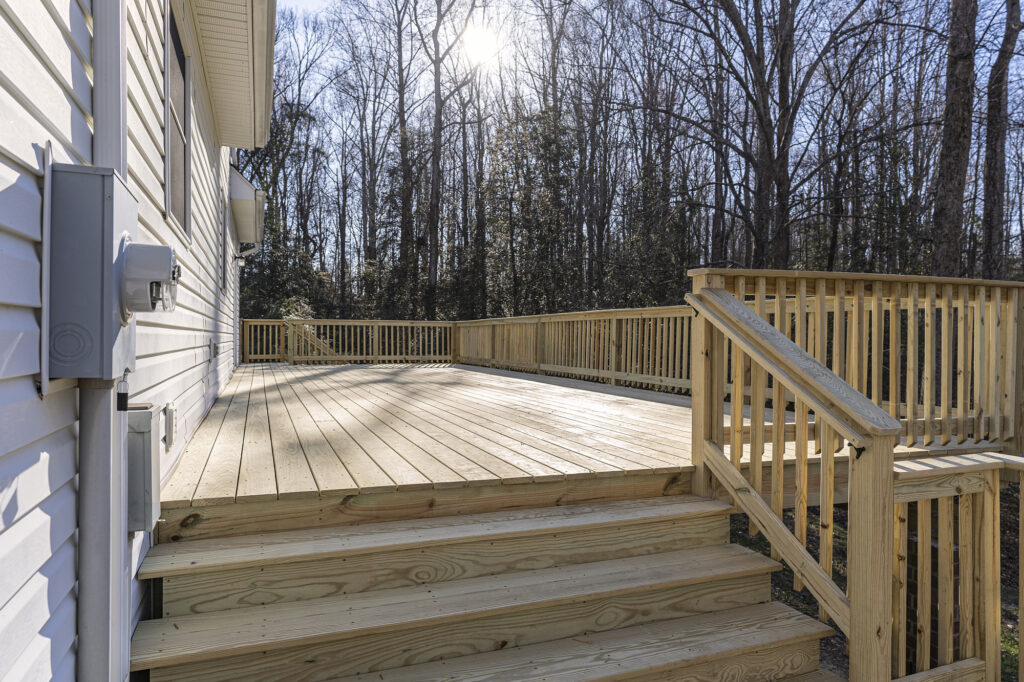 Wooden Deck With Railing Wide Steps And Spacious Layout For Outdoor Gatherings And Nature Views